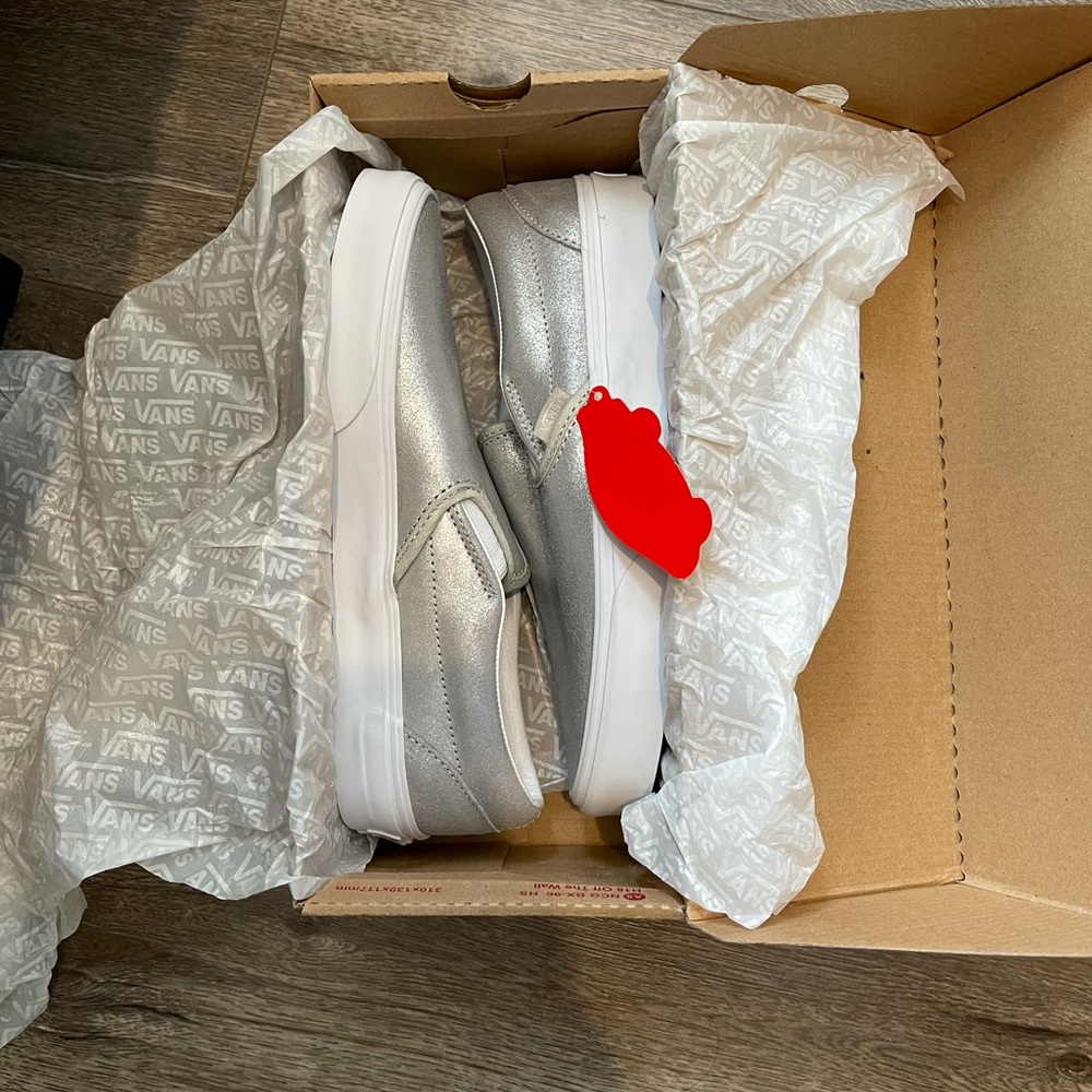 New women’s Vans silver.